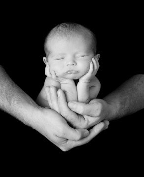 New Baby Photo Ideas - baby sitting in hands