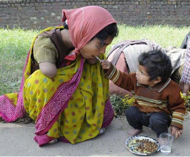 2 Year Old Offering Food To Her Handicapped Mom Human Diversity