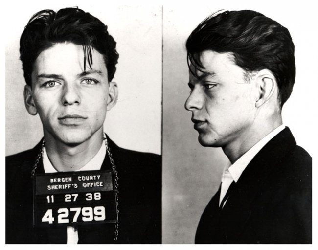 A 23-year-old Frank Sinatra has his mug shots taken after he was arrested for adultery and seduction, a crime at the time. [1938] Young Celebrity
