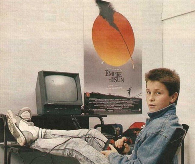 Christian Bale playing with his Amstrad computer. [c. 1984] Young Celebrity