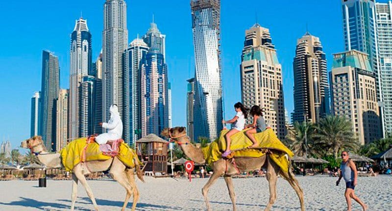 Camel rides on the beach Crazy Dubai