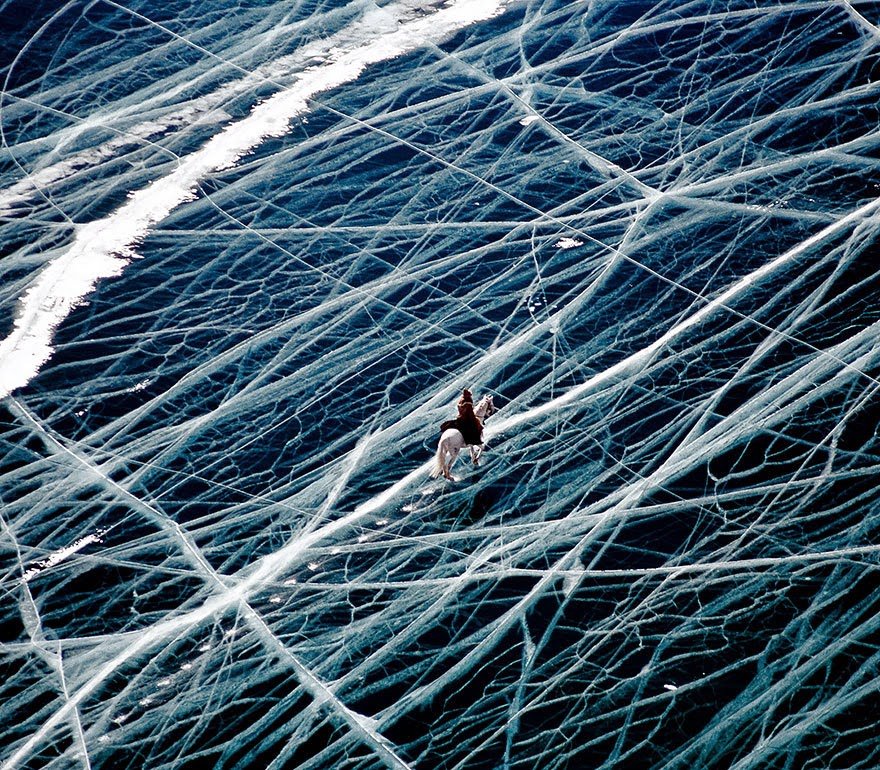 Ice Rider In Siberia, Russia Frozen Lake